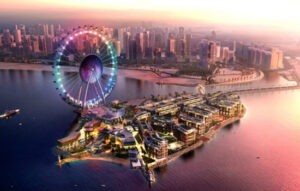 Olbrzymie koło widokowe na tle panoramy Dubaju. Traveligo Blog