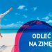 Kobieta w białej sukience skacząca na plaży. Traveligo Blog