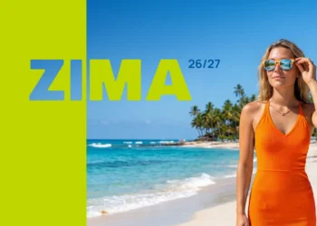 Coral Travel Zima 2026/2027 – kobieta na egzotycznej plaży, wakacje w ciepłych krajach