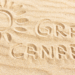 Napis Gran Canaria na piasku na plaży